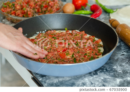 Traditional Turkish pizza (lahmacun) Traditional Turkish pizza (lahmacun) 67038900