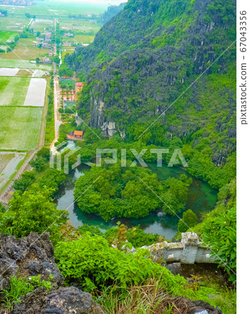 View on Tam Coc river from the top of Hang Mua View on Tam Coc river from the top of Hang Mua 67043356