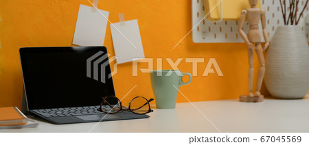 Stylish workspace with digital tablet, glasses, Stylish workspace with digital tablet, glasses, 67045569