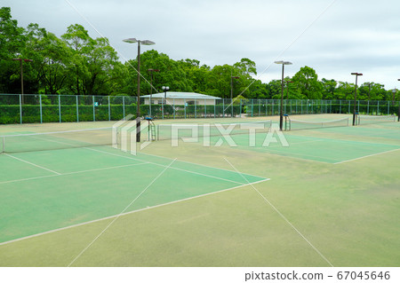 Large tennis court in the park 67045646