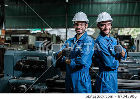 Engineer man in industry factory working. 67045906