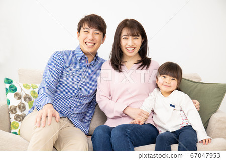 A young family with a smile A young family with a smile 67047953