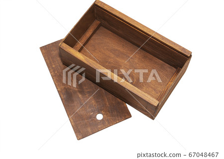 An empty wooden box. Made of pine and plywood, on a light white background. An empty wooden box. Made of pine and plywood, on a light white background. 67048467