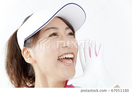 Women playing golf Women playing golf 67051180