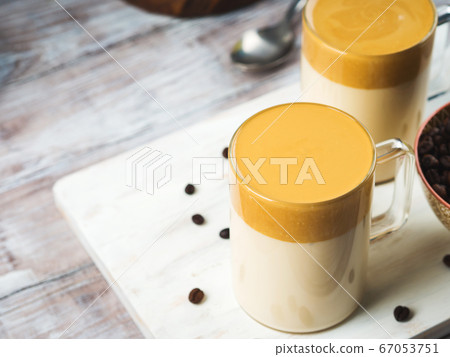 Whipped dalgona coffee drink in mug 67053751