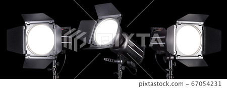 Set of photography studio flash isolated on black Set of photography studio flash isolated on black 67054231