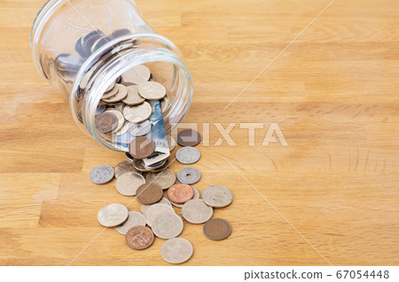 Image of money spilling Image of money spilling 67054448