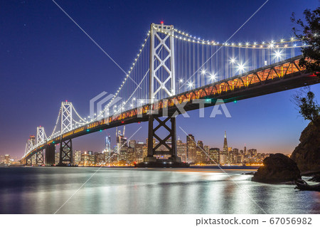 San Francisco skyline with Oakland Bay Bridge at night, California, USA San Francisco skyline with Oakland Bay Bridge at night, California, USA 67056982