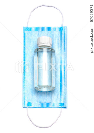 bottle of cream, lotion, sanitizer or liquid soap and protective mask isolated on white background bottle of cream, lotion, sanitizer or liquid soap and protective mask isolated on white background 67059571