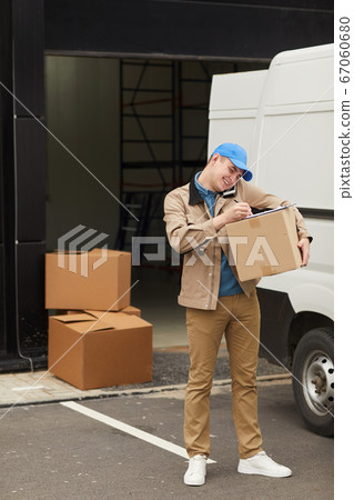 Man working with load Man working with load 67060680