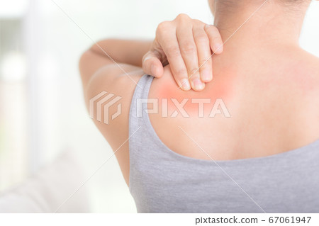 Closeup asian woman neck and shoulder pain and injury. Health care and medical concept. Closeup asian woman neck and shoulder pain and injury. Health care and medical concept. 67061947