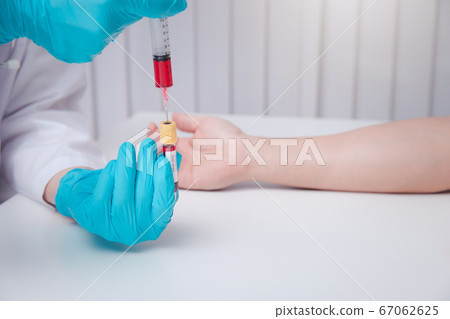 Doctor or Medical staff collect blood samples from patients infected with coronavirus or COVID-19. Doctor or Medical staff collect blood samples from patients infected with coronavirus or COVID-19. 67062625