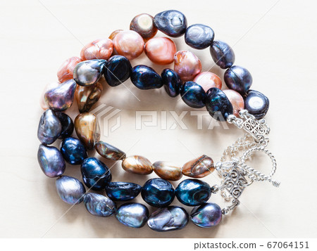handcrafted bracelet from colored river pearls 67064151