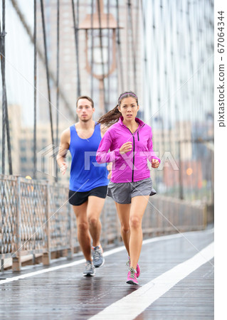 Running couple Running couple 67064344