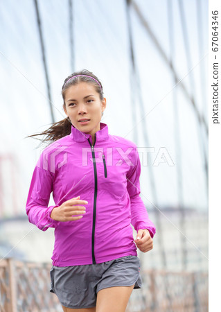 Running woman jogging in city Running woman jogging in city 67064346