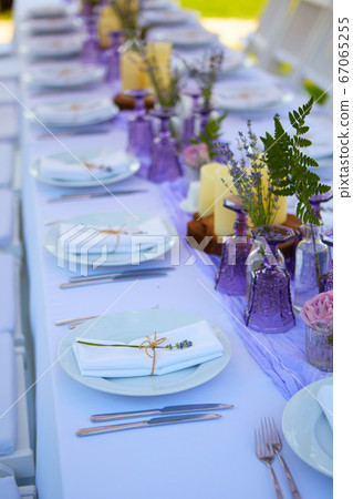 Table set for wedding or another catered event dinner. Table set for wedding or another catered event dinner. 67065255