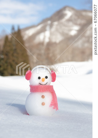 Snowman with earmuffs 67066077