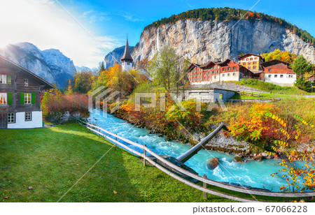 Stunning autumn view of Lauterbrunnen village with 67066228