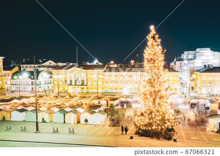 Helsinki, Finland. Christmas Xmas Market With Christmas Tree On Senate Square In Evening Night Illuminations. 67066321