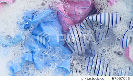 Color clothes soak in powder detergent water Color clothes soak in powder detergent water 67067006