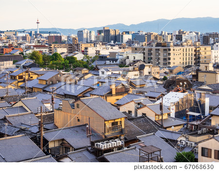 Gion neighborhood and Kyoto Tower at dusk Gion neighborhood and Kyoto Tower at dusk 67068630