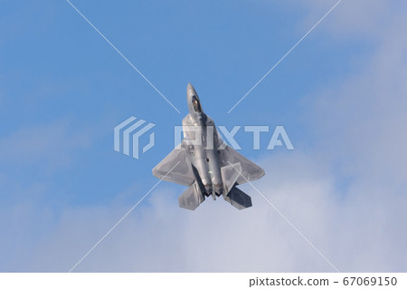US Air Force F-22 Raptor through clouds 67069150