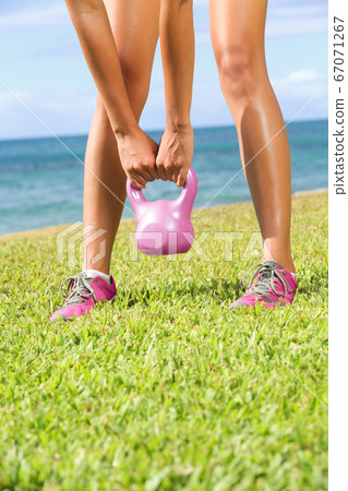 Kettlebell fitness training woman 67071267
