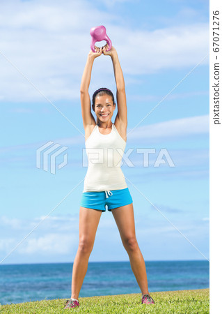 Fitness crossfit woman outdoors 67071276
