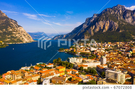 Italian city of Lecco on shore of Lake Como 67072808