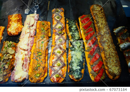 Coca de recapte, a thin crust vegetable pizza or tarte Coca de recapte, a thin crust vegetable pizza or tarte 67073184