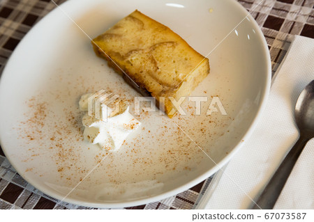 Pan de Calatrava with creme, pudding cake typical from Spain 67073587