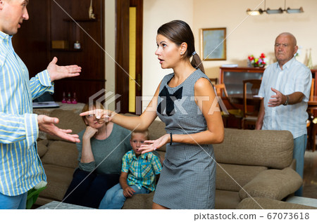 Family of five having quarrel at home 67073618