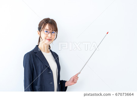 A woman with glasses explaining. A woman with glasses explaining. 67073664