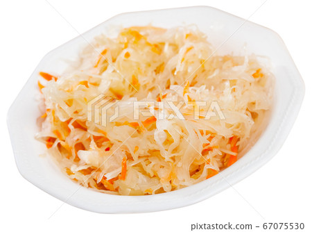 Sauerkraut with carrots in bowl 67075530