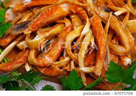 Smoked salmon belly strips, close up Smoked salmon belly strips, close up 67075709