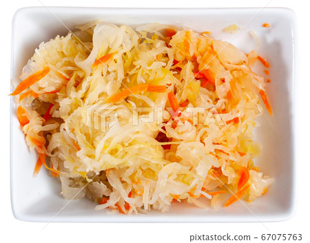 Sour shredded cabbage in plate Sour shredded cabbage in plate 67075763