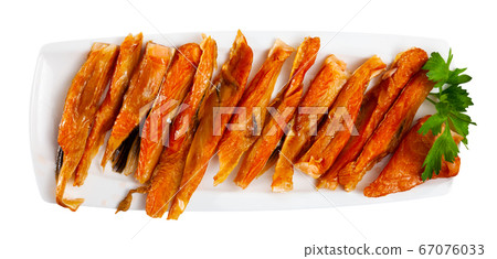 Smoked salmon belly strips with parsley 67076033
