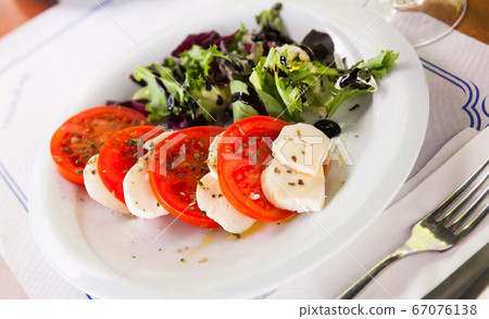 Fresh italian caprese salad Fresh italian caprese salad 67076138