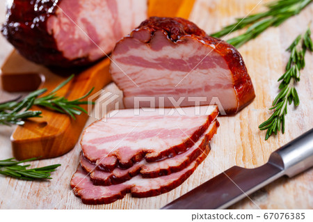 Russian tasty meal smoked brisket at wooden desk Russian tasty meal smoked brisket at wooden desk 67076385