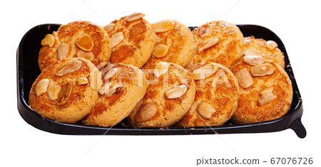 Plastic tray with almond cookies Plastic tray with almond cookies 67076726
