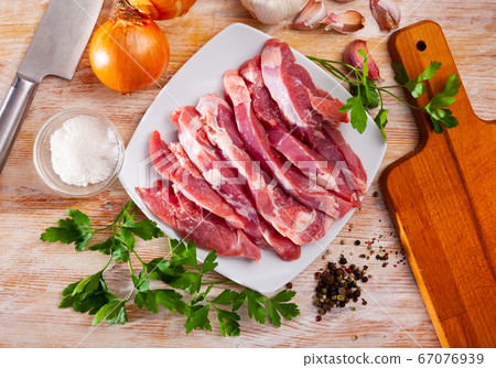 Raw turkey thigh ready for cooking Raw turkey thigh ready for cooking 67076939
