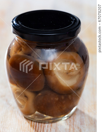Closed glass jar with natural shiitake Closed glass jar with natural shiitake 67078207