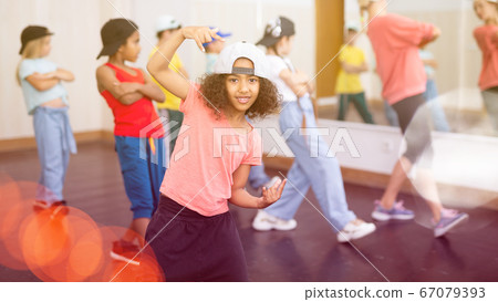 Afro girl hip hop dancer performing at class Afro girl hip hop dancer performing at class 67079393