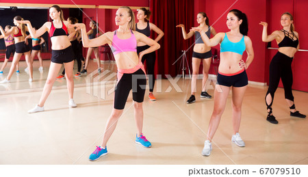 Active females dancing excited posing 67079510