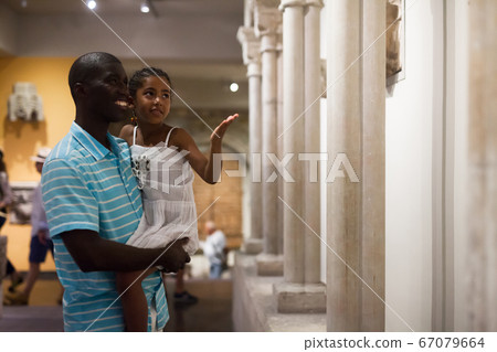 Man and his daughter at hall of Museum Man and his daughter at hall of Museum 67079664
