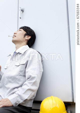 Worker taking a rest 67083344