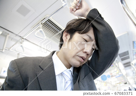 Businessman with poor physical condition Businessman with poor physical condition 67083371