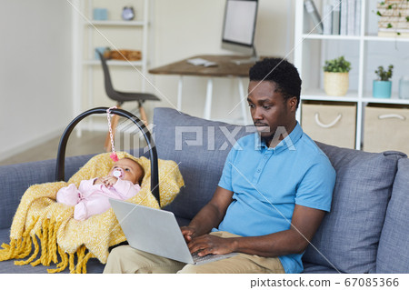 Father working at home 67085366