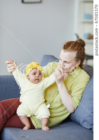 Mother playing with child Mother playing with child 67085370