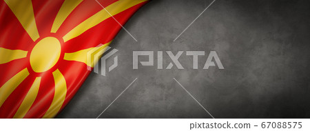 Macedonian flag on concrete wall banner 67088575